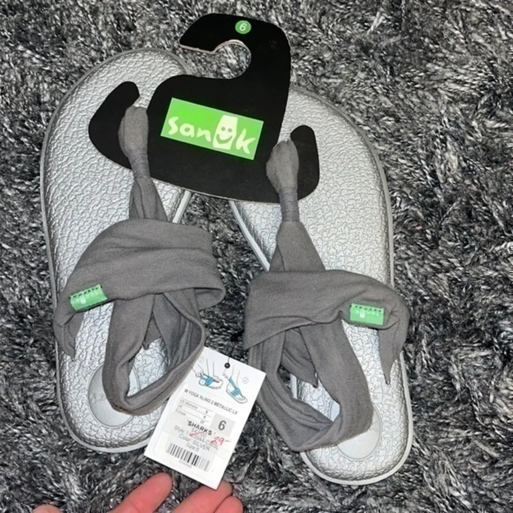Metallic Sanuk size 6